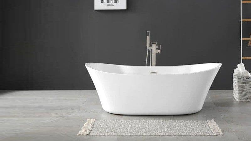 Kohler Freestanding Tub in front of gray wall