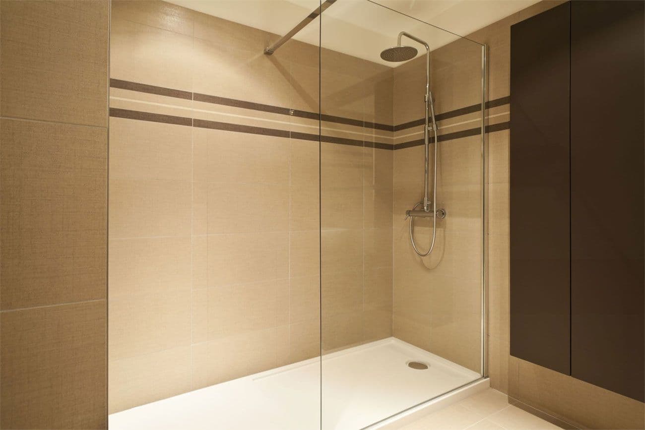 walk in shower with an offset drain