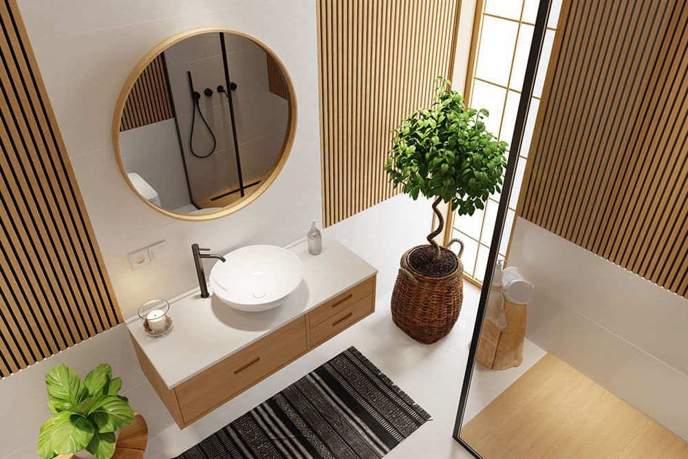 Modern Scandinavian and Japandi bathroom with wooden vanity, round mirror, white vessel sink, potted plants, and striped floor mat