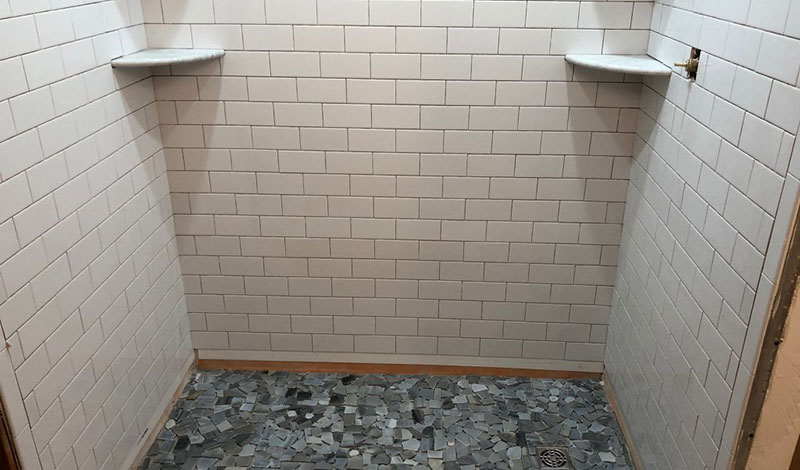https://www.totalbathsystems.com/wp-content/uploads/2019/09/bathroom-tile-replacement.jpg
